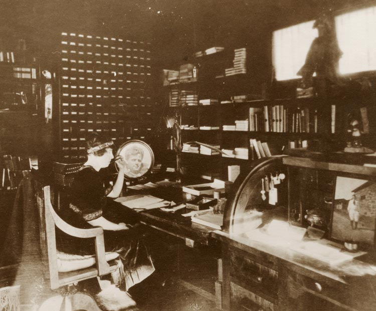 Charmain London at her desk.