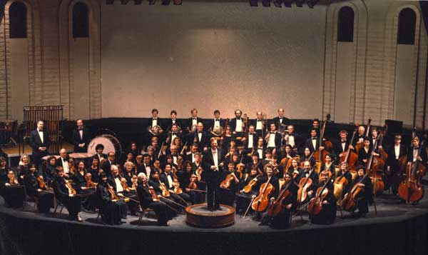 Santa Rosa Symphony with conductor facing the audience.